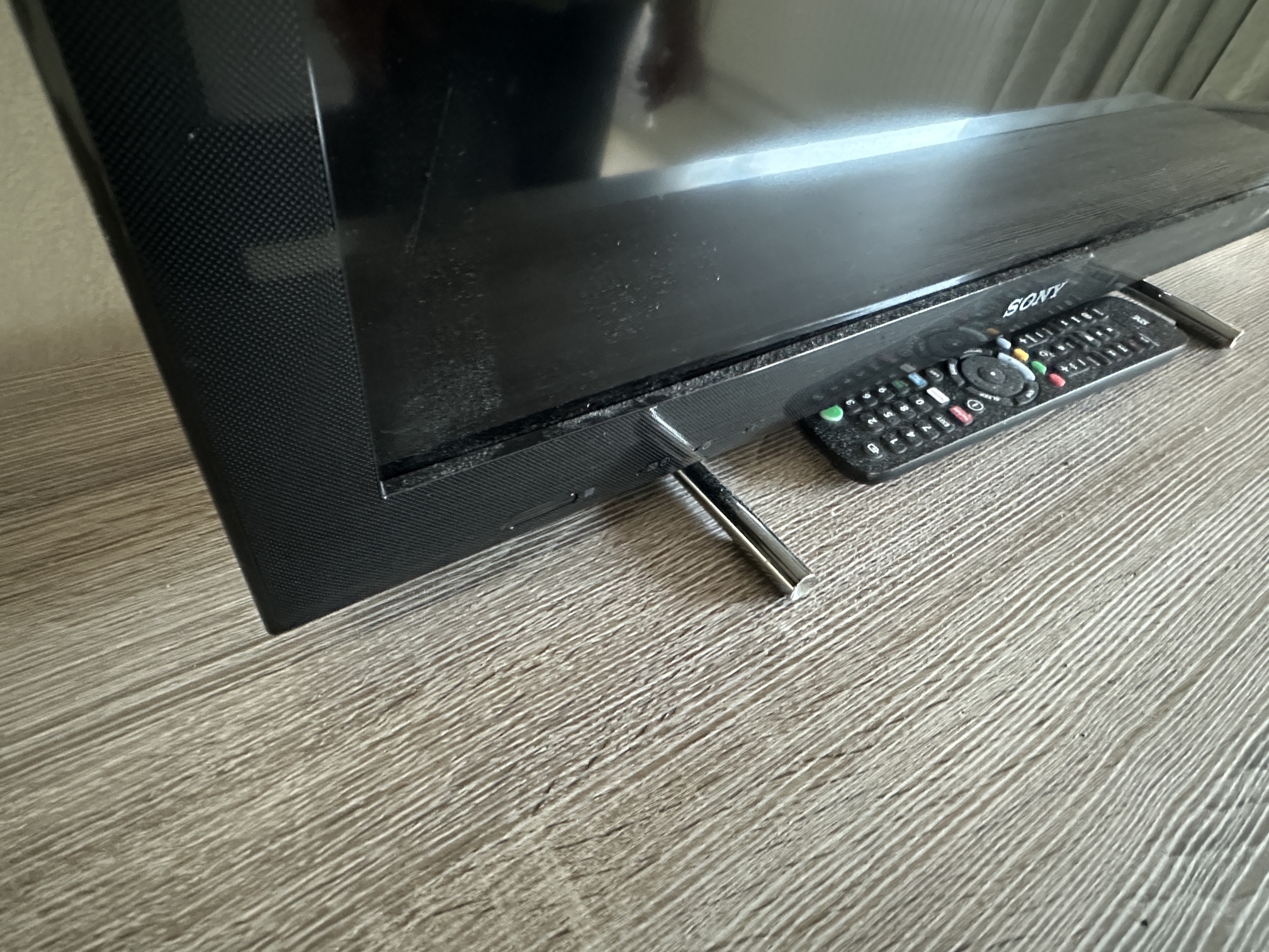 Fine layer of charred dust around TV