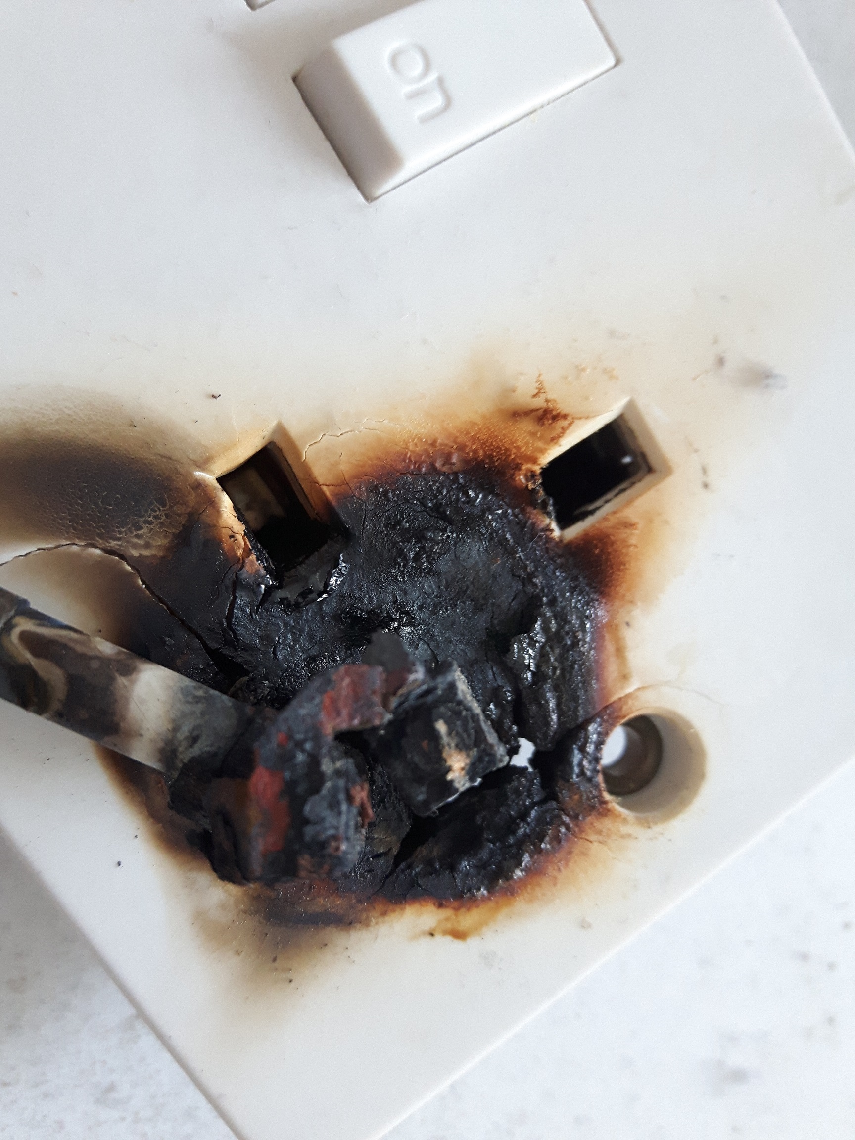 Scorching & Burning on a Plug socket